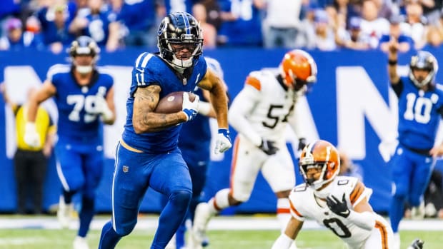 Oct 22, 2023; Indianapolis, Indiana, USA; Indianapolis Colts wide receiver Michael Pittman Jr. (11) runs for a touchdown in the second half against the Cleveland Browns at Lucas Oil Stadium. Mandatory Credit: Trevor Ruszkowski-USA TODAY Sports